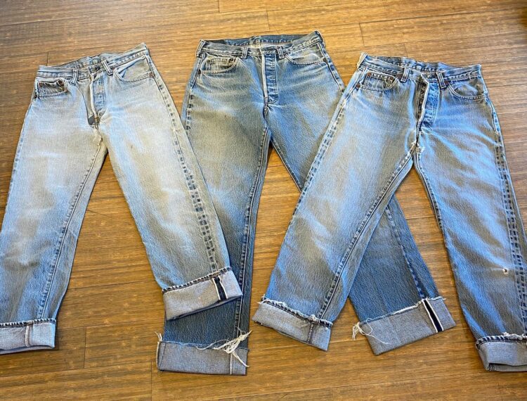 three pairs of jeans