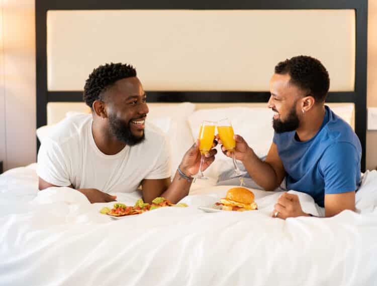 Couple cheers in bed