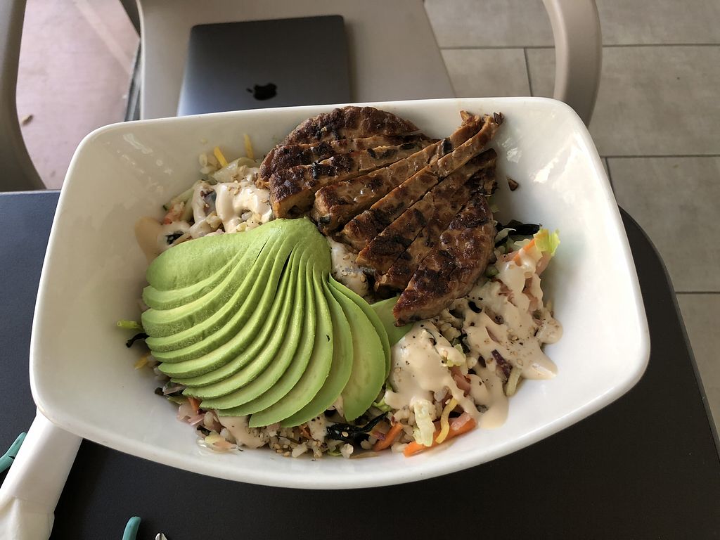 Avocado roll in a bowl with tempeh