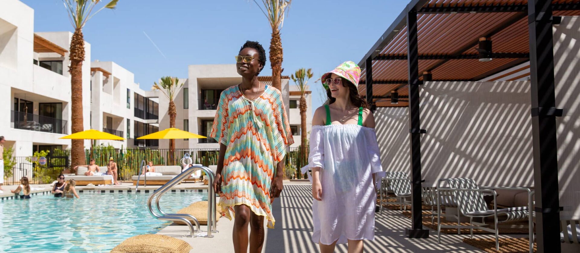 Two women poolside at the Drift Hotel