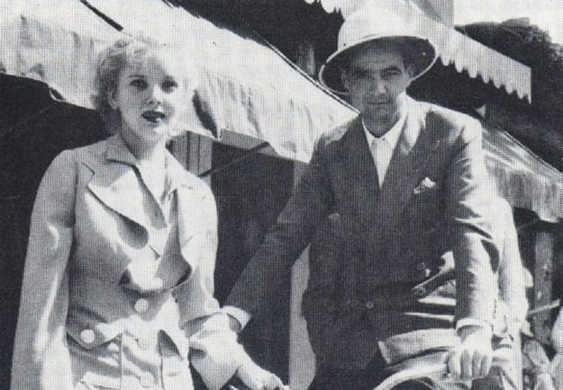 Howard Hughes and Ida Lupino bask in the sun on Palm Canyon Drive during April 1935